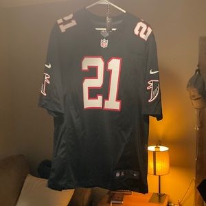 Size Large Nike Deion Sanders jersey.